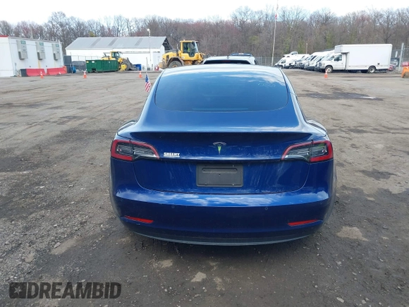2022 Tesla Model 3 with VIN 5YJ3E1EA7NF188417, listed as a IAAI auction lot 41885623 with 105,457 mi miles and . Bid and sale history available at DreamBid. Image 16.