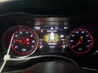 2015 Dodge Charger SE z VIN 2C3CDXBG6FH848445, wystawiony jako Copart lot #54825915 z przebiegiem 121 764 mil mil oraz Szkoda całkowita • Salvage title. Historia ofert i sprzedaży dostępna na DreamBid. Obrazek 9.