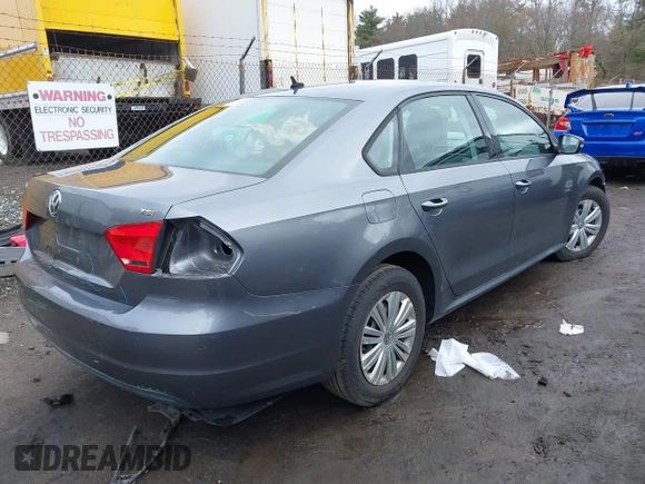 2015 Volkswagen Passat Wolfsburg Edition with VIN 1VWAT7A37FC026077, listed as a IAAI auction lot 41630524 with 136,966 mi miles and . Bid and sale history available at DreamBid. Image 4.
