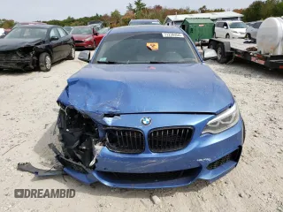 2016 BMW 2 Series M235i xDrive with VIN WBA1J9C52GV372057, listed as a Copart auction lot 71236354 with 89,420 mi miles and Salvage Title. Bid and sale history available at carsss.com. Image 5.