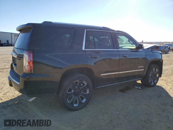 2018 GMC Yukon Denali with VIN 1GKS2CKJ3JR404177, listed as a Copart auction lot 82577354 with 129,744 mi miles and Salvage Title. Bid and sale history available at carsss.com. Image 3.