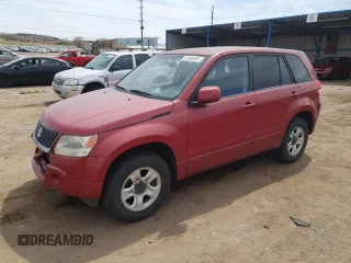 2012 Suzuki Grand Vitara Premium z VIN JS3TD0D20C4101342, wystawiony jako Copart lot #51956595 z przebiegiem 166 710 mil mil oraz Szkody całkowita. Historia ofert i sprzedaży dostępna na DreamBid. Obrazek 1.
