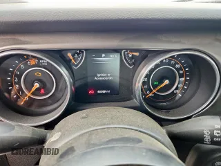 2023 Jeep Wrangler Sport with VIN 1C4HJXAG4PW667732, listed as a Copart auction lot 61261215 with 48,089 mi miles and Salvage title. Bid and sale history available at DreamBid. Image 9.