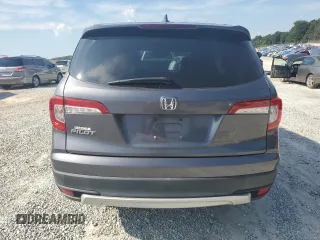 2019 Honda Pilot EX-L with VIN 5FNYF5H50KB034846, listed as a Copart auction lot 63022845 with 56,241 mi miles and Salvage title. Bid and sale history available at DreamBid. Image 6.