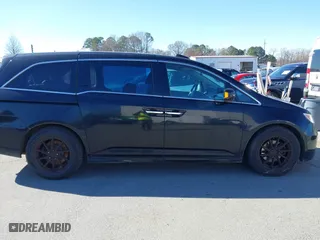 2013 Honda Odyssey Touring with VIN 5FNRL5H99DB076385, listed as a IAAI auction lot 41751504 with 233,875 mi miles. Bid and sale history available at carsss.com. Image 13.