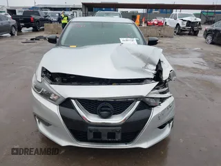 2017 Nissan Maxima S with VIN 1N4AA6AP0HC413164, listed as a IAAI auction lot 41497747 with 225,799 mi miles and . Bid and sale history available at DreamBid. Image 13.