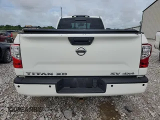 2017 Nissan Titan SV z VIN 1N6AA1RP1HN561729, wystawiony jako Copart lot #56866115 z przebiegiem 27 590 mil mil oraz Szkoda całkowita • Salvage title. Historia ofert i sprzedaży dostępna na DreamBid. Obrazek 6.