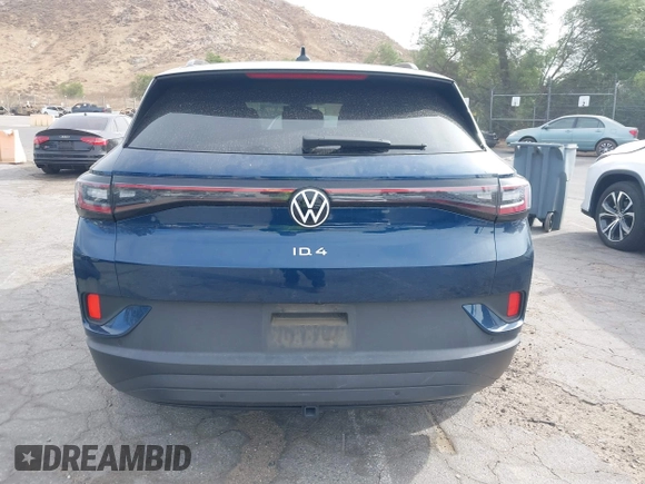 2023 Volkswagen ID.4 Pro z VIN 1V2DNPE8XPC019169, wystawiony jako IAAI lot #41313501 z przebiegiem 32 552 mil mil oraz . Historia ofert i sprzedaży dostępna na DreamBid. Obrazek 17.