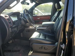 2019 Ram 1500 Rebel z VIN 1C6SRFLT5KN811457, wystawiony jako Copart lot #57034285 z przebiegiem 84 077 mil mil oraz Szkoda całkowita • Salvage title. Historia ofert i sprzedaży dostępna na DreamBid. Obrazek 7.