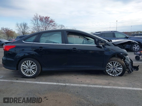 2018 Ford Focus Titanium с VIN 1FADP3J2XJL294107, выставлен на аукционе IAAI как лот 42005814 с пробегом 93 239 миль миль и . История ставок и продаж доступна на DreamBid. Изображение 13.