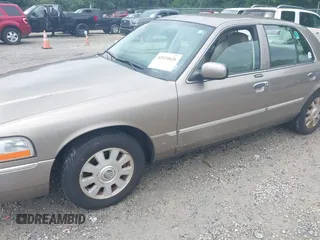 2005 Mercury Grand Marquis LS Premium z VIN 2MEFM75W25X661590, wystawiony jako IAAI lot #42534626 z przebiegiem 113 450 mil mil oraz . Historia ofert i sprzedaży dostępna na DreamBid. Obrazek 6.