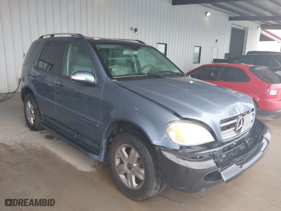 2005 Mercedes-Benz M-Class 3.7L with VIN 4JGAB57E25A560516, listed as a IAAI auction lot 41898369 with 125,927 mi miles. Bid and sale history available at carsss.com. Image 1.