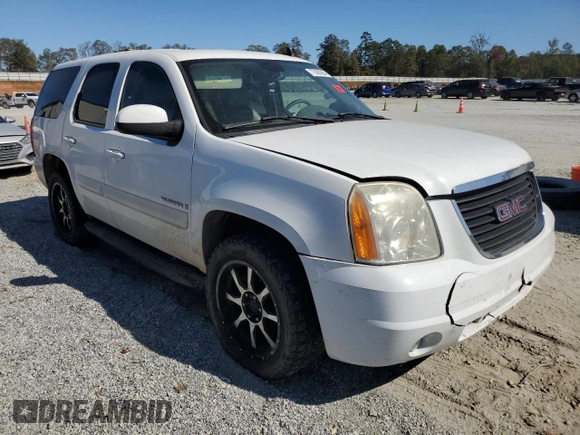 2007 GMC Yukon SLE with VIN 1GKFK13017J109923, listed as a Copart auction lot 77085954 with 214,986 mi miles and Salvage Title. Bid and sale history available at carsss.com. Image 4.