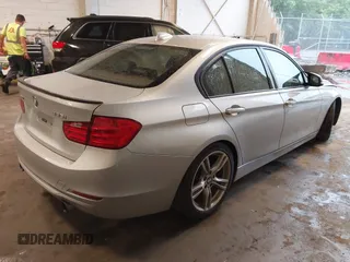 2013 BMW 3 Series 335i xDrive with VIN WBA3B9C55DF587637, listed as a IAAI auction lot 42538708 with 131,730 mi miles and . Bid and sale history available at DreamBid. Image 4.
