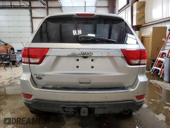 2013 Jeep Grand Cherokee Overland with VIN 1C4RJFCG2DC622345, listed as a Copart auction lot 49640325 with 192,144 mi miles and Salvage Title. Bid and sale history available at carsss.com. Image 6.