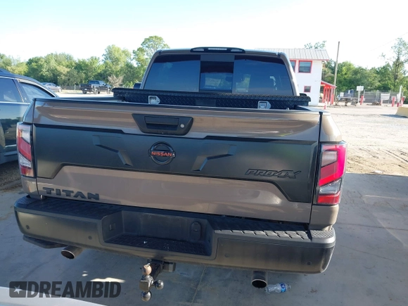 2021 Nissan Titan SV with VIN 1N6AA1ED1MN523973, listed as a IAAI auction lot 42406382 with 73,688 mi miles and . Bid and sale history available at DreamBid. Image 16.