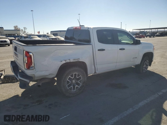 2022 GMC Canyon 4WD AT4 w/Leather with VIN 1GTG6FEN2N1200285, listed as a Copart auction lot 44564205 with 118,711 mi miles and Salvage Title. Bid and sale history available at carsss.com. Image 3.