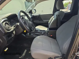 2017 Toyota Tacoma SR with VIN 5TFSX5EN2HX052027, listed as a IAAI auction lot 42832747 with 186,332 mi miles and . Bid and sale history available at DreamBid. Image 1.