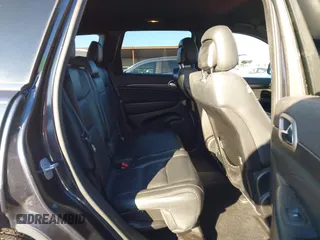 2014 Jeep Grand Cherokee Laredo with VIN 1C4RJEAG3EC218128, listed as a IAAI auction lot 40951611 with 119,596 mi miles and . Bid and sale history available at DreamBid. Image 8.