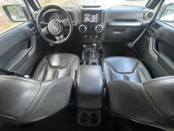 2016 Jeep Wrangler Unlimited 75th Anniversary with VIN 1C4BJWEG5GL215915, listed as a Copart auction lot 52680895 with 143,836 mi miles and Clean Title. Bid and sale history available at carsss.com. Image 9.