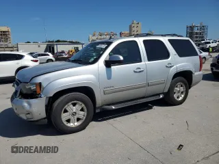 2013 Chevrolet Tahoe LT with VIN 1GNSKBE09DR240910, listed as a Copart auction lot 65982725 with 214,401 mi miles and Salvage title. Bid and sale history available at DreamBid. Image 1.
