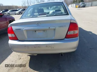 2000 Mazda Protege DX with VIN JM1BJ2227Y0240819, listed as a IAAI auction lot 41810228 with 68,650 mi miles and . Bid and sale history available at DreamBid. Image 16.