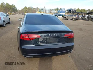 2017 Audi A8 L with VIN WAU44AFDXHN006857, listed as a IAAI auction lot 41758062 with 88,385 mi miles. Bid and sale history available at carsss.com. Image 16.