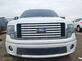 2011 Ford F-150 Lariat with VIN 1FTFW1E60BFA47055, listed as a IAAI auction lot 41693226 with 170,594 mi miles. Bid and sale history available at carsss.com. Image 6.