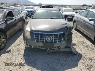 2012 Cadillac CTS Premium z VIN 1G6DS5E35C0128558, wystawiony jako Copart lot #65431155 z przebiegiem 186 593 mil mil oraz Szkoda całkowita • Salvage title. Historia ofert i sprzedaży dostępna na DreamBid. Obrazek 5.