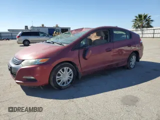 2010 Honda Insight LX with VIN JHMZE2H57AS031285, listed as a Copart auction lot 50231905 with 114,302 mi miles and Salvage Title. Bid and sale history available at DreamBid. Image 1.