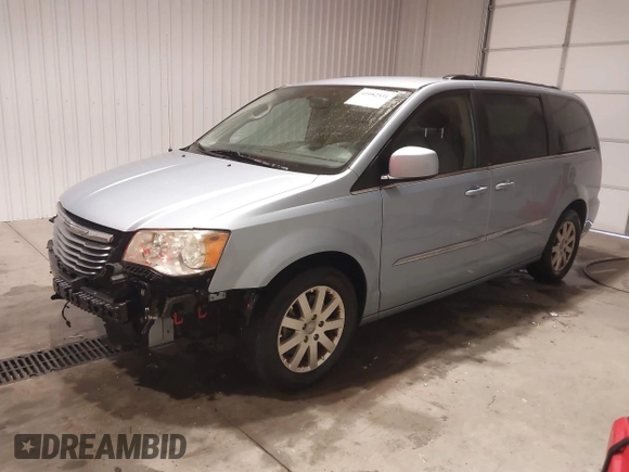 2013 Chrysler Town & Country Touring with VIN 2C4RC1BG8DR689862, listed as a IAAI auction lot 41082531 with 181,447 mi miles. Bid and sale history available at carsss.com. Image 2.