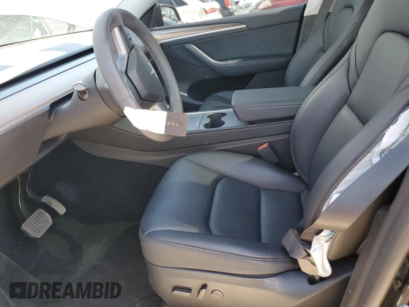 2023 Tesla Model Y Long Range with VIN 7SAYGDEE5PF850358, listed as a Copart auction lot 52581615 with 19,376 mi miles and Salvage Title. Bid and sale history available at DreamBid. Image 7.