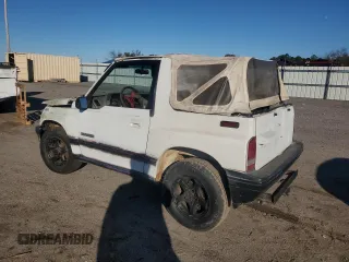 1990 Geo Tracker z VIN 2CNBJ18UXL6217744, wystawiony jako Copart lot #84203244 z przebiegiem 23 221 mil mil oraz Szkody całkowita. Historia ofert i sprzedaży dostępna na DreamBid. Obrazek 2.