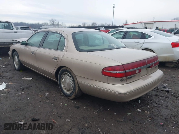 1997 Lincoln Continental with VIN 1LNLM97V3VY666104, listed as a IAAI auction lot 41650904 with 181,536 mi miles. Bid and sale history available at carsss.com. Image 3.