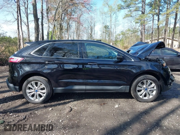 2022 Ford Edge Titanium with VIN 2FMPK4K95NBB06151, listed as a IAAI auction lot 41932545 with 57,762 mi miles and . Bid and sale history available at DreamBid. Image 13.