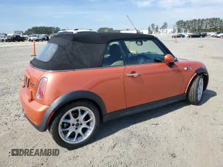 2006 MINI Convertible S with VIN WMWRH33576TF89127, listed as a Copart auction lot 49763365 with 150,446 mi miles and Salvage title. Bid and sale history available at DreamBid. Image 3.