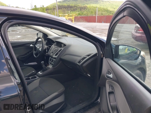 2013 Ford Focus SE z VIN 1FADP3F21DL370052, wystawiony jako IAAI lot #42208904 z przebiegiem 186 279 mil mil oraz . Historia ofert i sprzedaży dostępna na DreamBid. Obrazek 5.