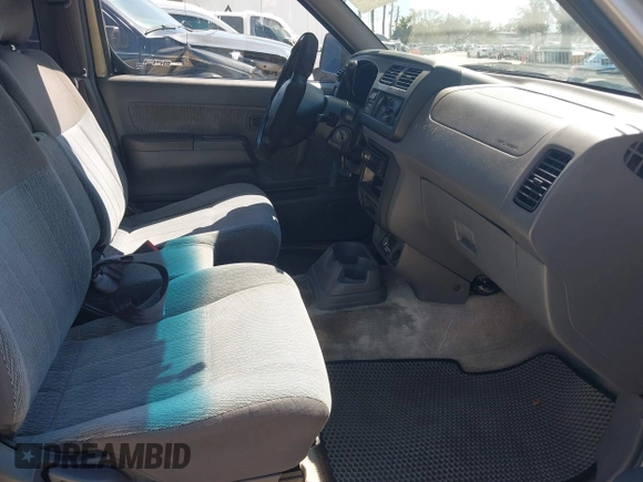 1999 Nissan Frontier XE z VIN 1N6DD26S4XC337030, wystawiony jako IAAI lot #41683250 z przebiegiem 143 765 mil mil oraz . Historia ofert i sprzedaży dostępna na DreamBid. Obrazek 5.