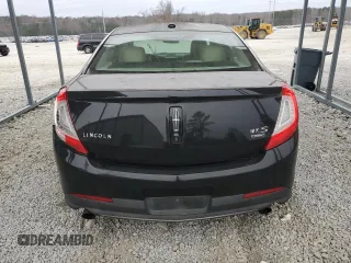 2014 Lincoln MKS EcoBoost z VIN 1LNHL9FT5EG601141, wystawiony jako Copart lot #86497854 z przebiegiem 136 915 mil mil oraz Szkoda całkowita • Salvage title. Historia ofert i sprzedaży dostępna na DreamBid. Obrazek 6.