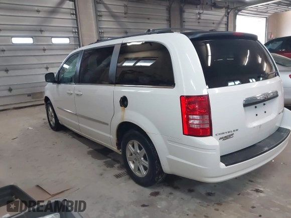2010 Chrysler Town & Country Touring with VIN 2A4RR5D10AR369617, listed as a IAAI auction lot 42158748 with 174,437 mi miles and . Bid and sale history available at DreamBid. Image 3.