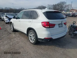 2016 BMW X5 xDrive35i with VIN 5UXKR0C5XG0P21683, listed as a IAAI auction lot 41717151 with 98,696 mi miles. Bid and sale history available at carsss.com. Image 3.
