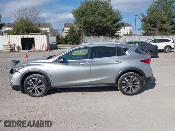 2019 Infiniti QX30 Luxe with VIN SJKCH5CRXKA011966, listed as a IAAI auction lot 40800082 with 56,138 mi miles and . Bid and sale history available at DreamBid. Image 14.