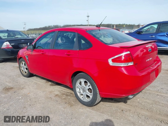 2008 Ford Focus SE with VIN 1FAHP35N58W219099, listed as a IAAI auction lot 42059347 with 209,309 mi miles. Bid and sale history available at carsss.com. Image 3.