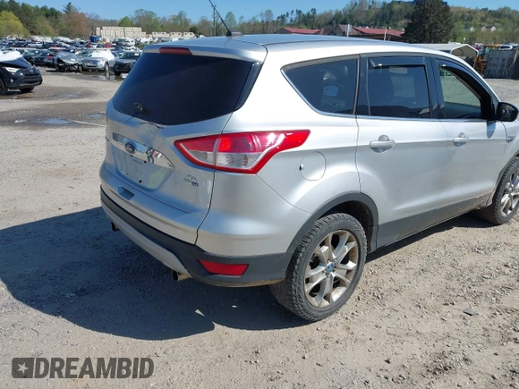 2013 Ford Escape SEL with VIN 1FMCU9H94DUA25017, listed as a IAAI auction lot 41976238 with 171,885 mi miles and . Bid and sale history available at DreamBid. Image 4.