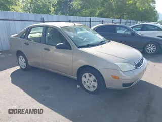 2007 Ford Focus S z VIN 1FAHP34N77W207844, wystawiony jako IAAI lot #42415939 z przebiegiem 197 911 mil mil oraz . Historia ofert i sprzedaży dostępna na DreamBid. Obrazek 1.