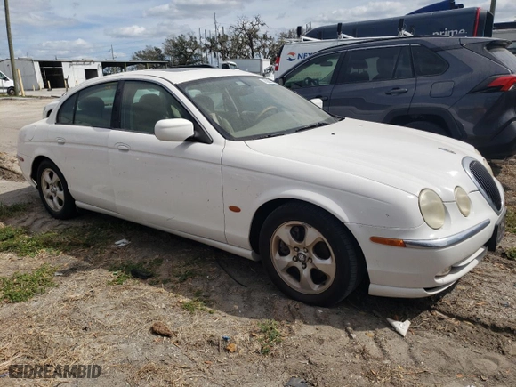 2002 Jaguar S-Type V6 with VIN SAJDA01N72FM21854, listed as a Copart auction lot 75503554 with 0 mi miles and Salvage Title. Bid and sale history available at carsss.com. Image 4.