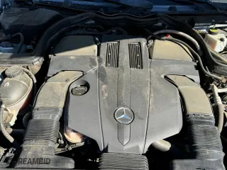 2015 Mercedes-Benz E-Class E 400 with VIN WDDKJ6FB2FF307294, listed as a Copart auction lot 77882794 with 82,173 mi miles and Salvage Title. Bid and sale history available at carsss.com. Image 7.