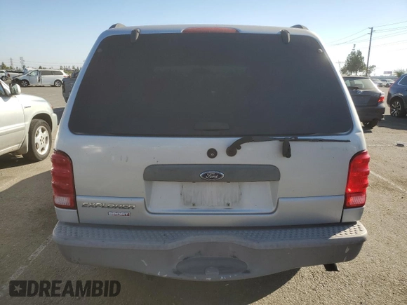 2002 Ford Explorer with VIN 1FMCU60E52UB90353, listed as a Copart auction lot 75659554 with 212,592 mi miles and Salvage title. Bid and sale history available at DreamBid. Image 6.