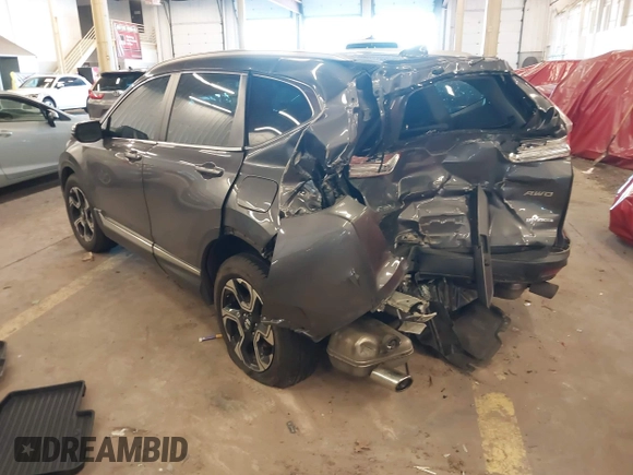 2018 Honda CR-V Touring with VIN 2HKRW2H91JH634457, listed as a IAAI auction lot 41697658 with 101,878 mi miles. Bid and sale history available at carsss.com. Image 3.