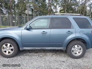 2010 Ford Escape Limited with VIN 1FMCU9EG1AKB89593, listed as a IAAI auction lot 41993888 with 121,175 mi miles. Bid and sale history available at carsss.com. Image 14.